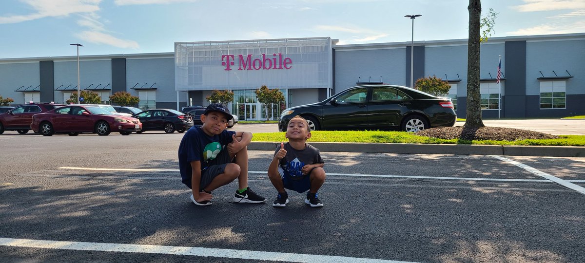 On our second leg of our trip and the lil guy starts screaming, ' Dad, T-Mobile! That's a big one.' Had to stop and take the obligatory pic:) @TMobile #bestcallcenterever