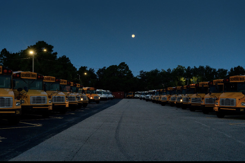 NewHanoverCoSch's tweet photo. Bus drivers were the first faces many students saw today. While the moon was still high they were reporting to our central and north garages, performing bus checks and cranking engines. Senior Staff met them there with donuts and coffee before the routes started. #NHCSback2school https://t.co/oQfFIf95pC