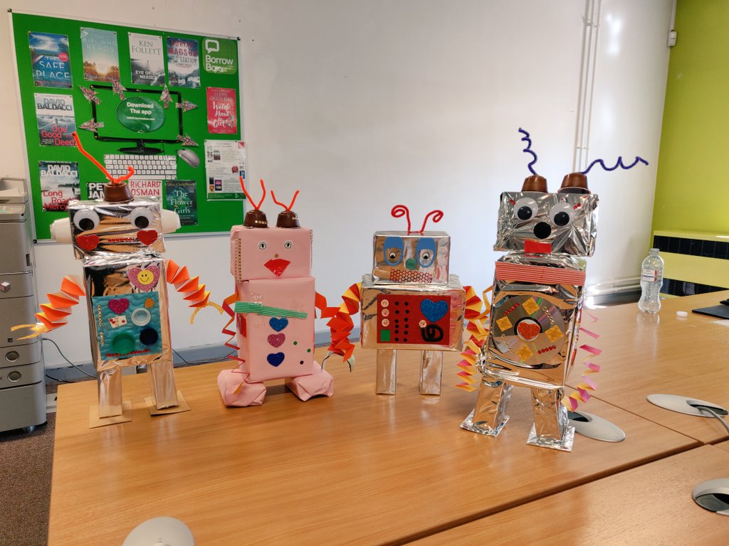 gin_and_lit's tweet photo. What do robot puppies do? The byte! Bad jokes aside, meet the 10 robots of #ChesterLaneLibrary. They're GREAT and entirely made out of recycled products. And they don't byte 🤖 https://t.co/Yhe1hjYWpQ