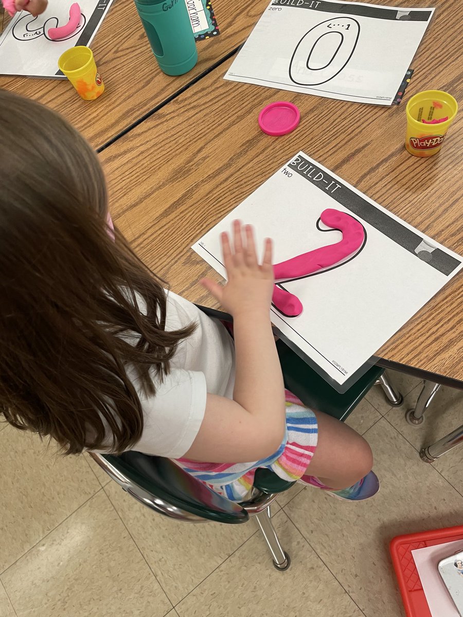 Building numbers with play-doh. A favorite among everyone. #whesheroes , #BelieveAchieveSucceed , #whes