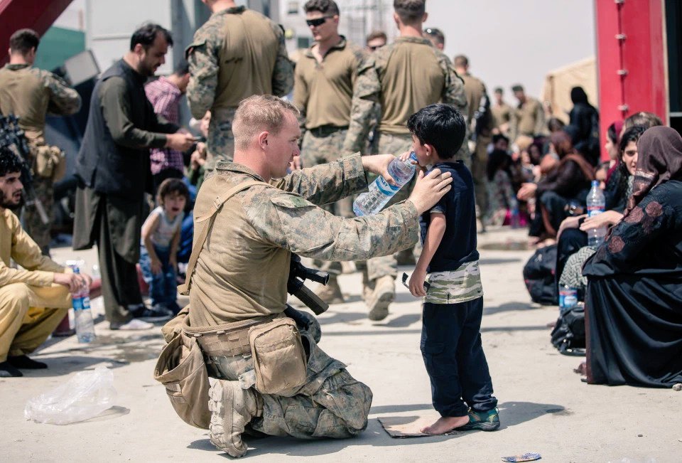CALL OF DUTY: HEART-warming pictures of Marines tending to Afghani children have gone viral as evacuations continue following the Taliban's takeover of Afghanistan. 

Thankful for our military. 🇺🇲
#Afghanistan @USMC #PrayForOurTroops