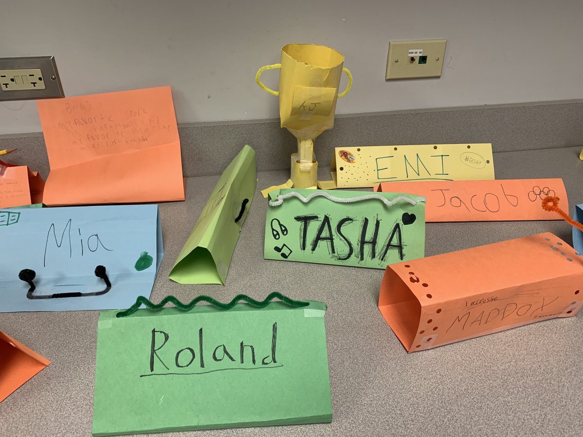 Using only 1 piece of construction paper, 1 pipe cleaner, and tape #WeAreD34 Ss designed and built name tags that can hold a pencil! #WildcatWay