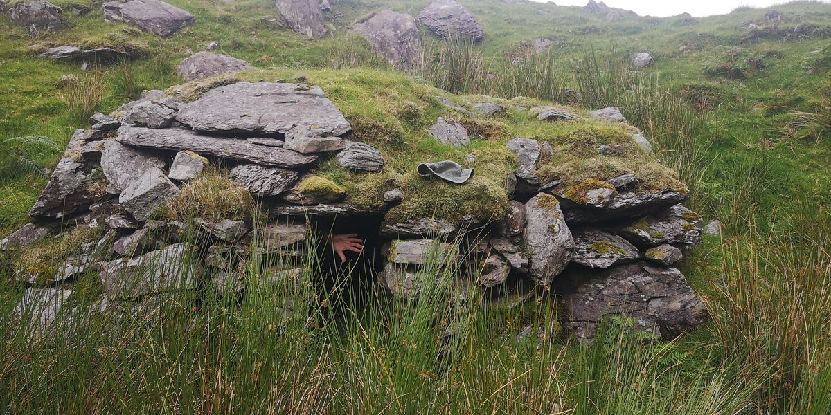 An intact sweat house, one of only 3 recorded so far in Kerry. A fire was built inside and raked out. Then it operated as a theraputic sauna with space for 1 or 2 people. This one from Com Úra in central Iveragh. Hand visible just inside for scale.