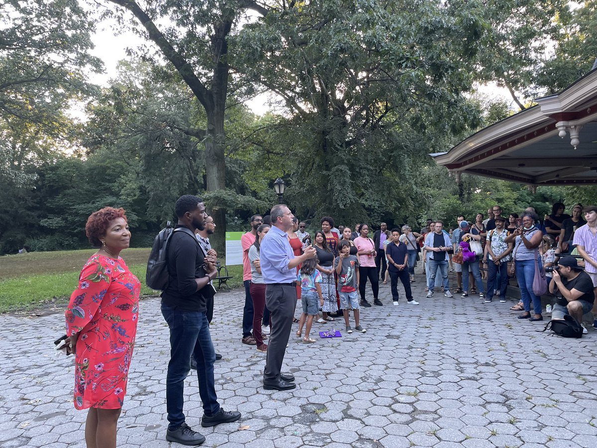 Photo of Brad Lander speaking to a small crowd in prospect park