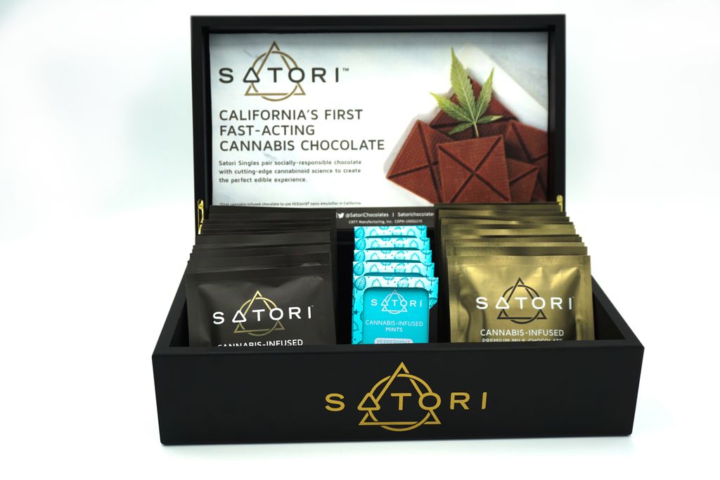 ZackDarling's tweet photo. The Satori Chocolate Box. The @Satoriedibles confections brand needed some shelf appeal at the checkout counter. I produced these custom boxes that match the packaging and style of @CannaCraftInc delicious microdosed cannabis chocolates and mints. 
#cannabisretail https://t.co/8QAeXNFc9C