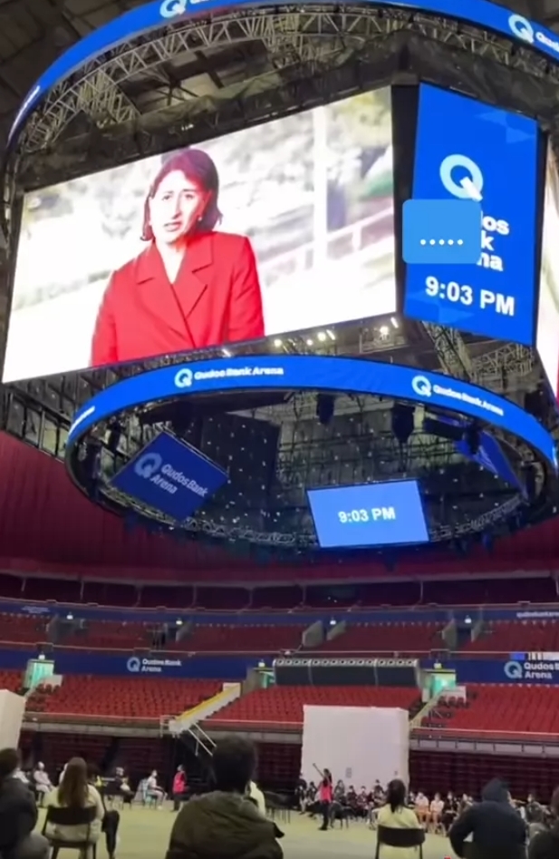 Ssamas34's tweet image. I'm not anti-vaccine but what the fuck is this?! What is going on in Australia?!

Kids are taken away from their parents, herded into a stadium, and forced to sit and watch a giant screen of of a fucking politician while they have the jab.

Why aren;t they fighting this?!