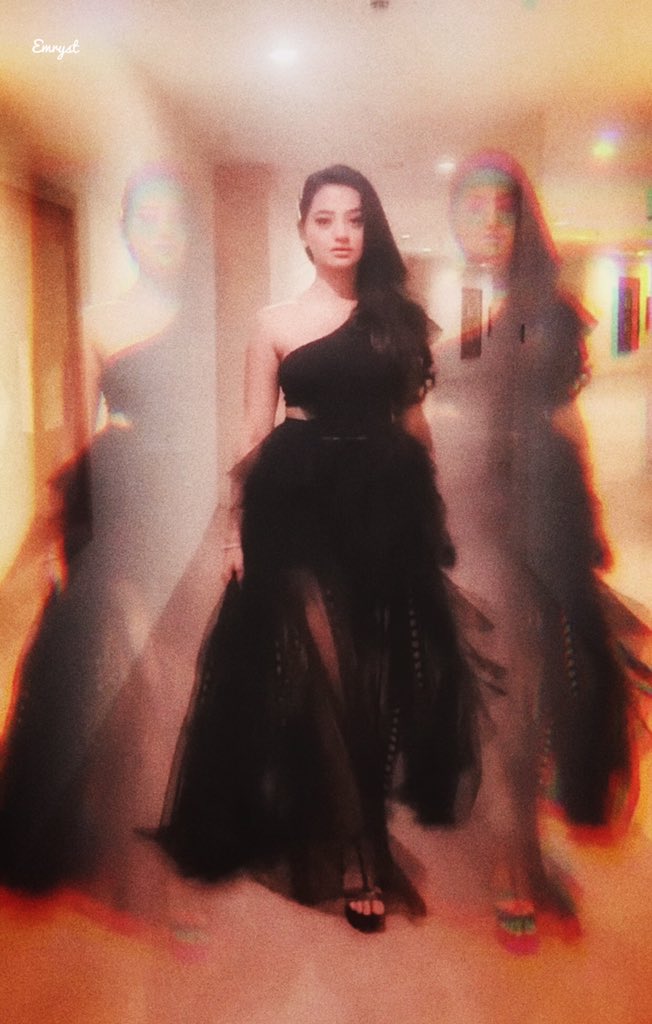 ‘Walk like you belong to the storms and rainbows 🖤🌪☄️.’ -Emryst

Spreads Her wings and slays in the black dress🔥...
#HellyShah #AngelInBlack