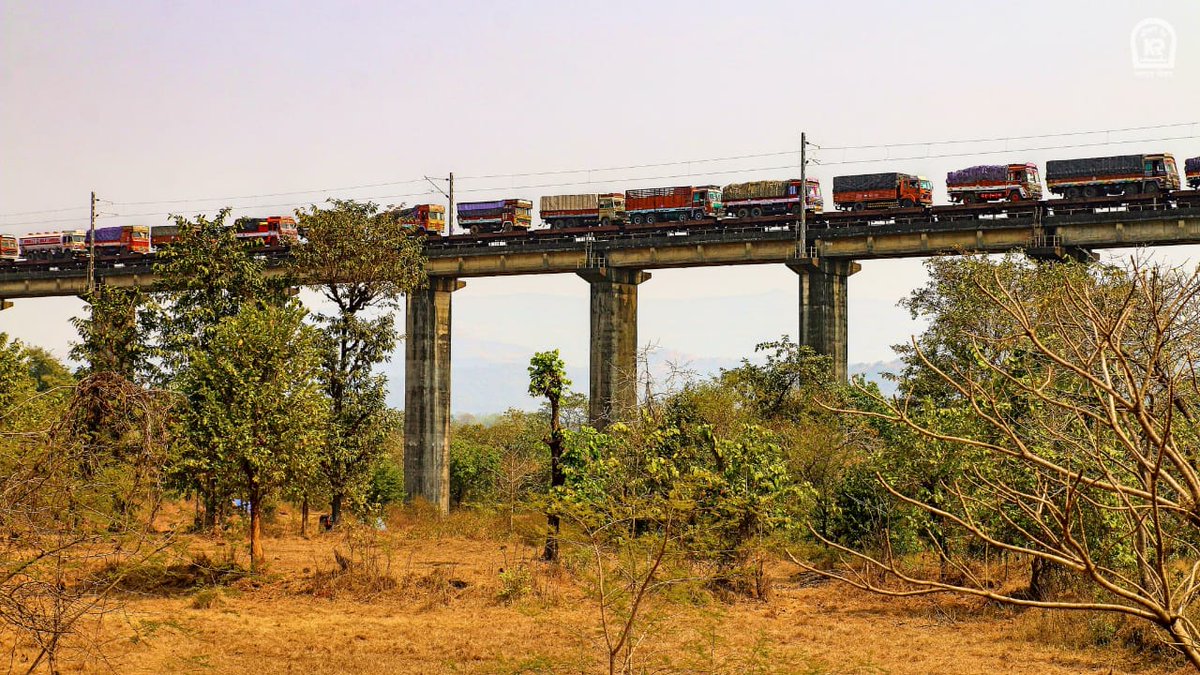 Picturesque capture of Ro-Ro (Roll On - Roll Off) gliding over Asurde Bridge journeying between Aravali Road &amp; Savarda Railway Station in Konkan region.