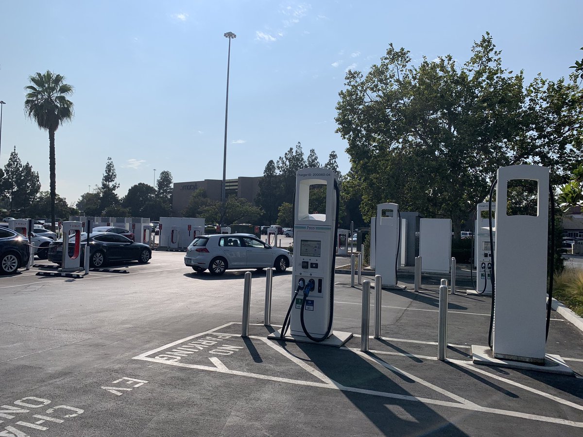 1st time to see Electrify America right next to Tesla Supercharger. Location: Brea Mall.
