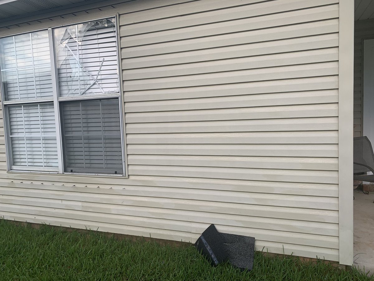 Lcarlson519's tweet photo. A twister came through and smashed shingles into my window…. Now we have to vacuum my grass https://t.co/AmlrU57mdh