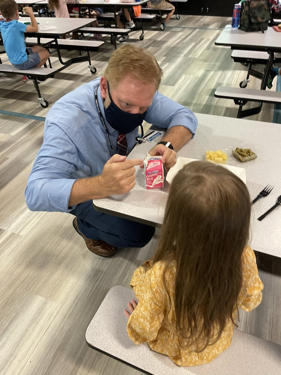 ReadMatz's tweet photo. @DrJ_Anderson stopped by @PittmanEagles during lunch on the first day of school. He shared tips on the best way to open milk. @officialSPS https://t.co/eqLmYtXcoJ
