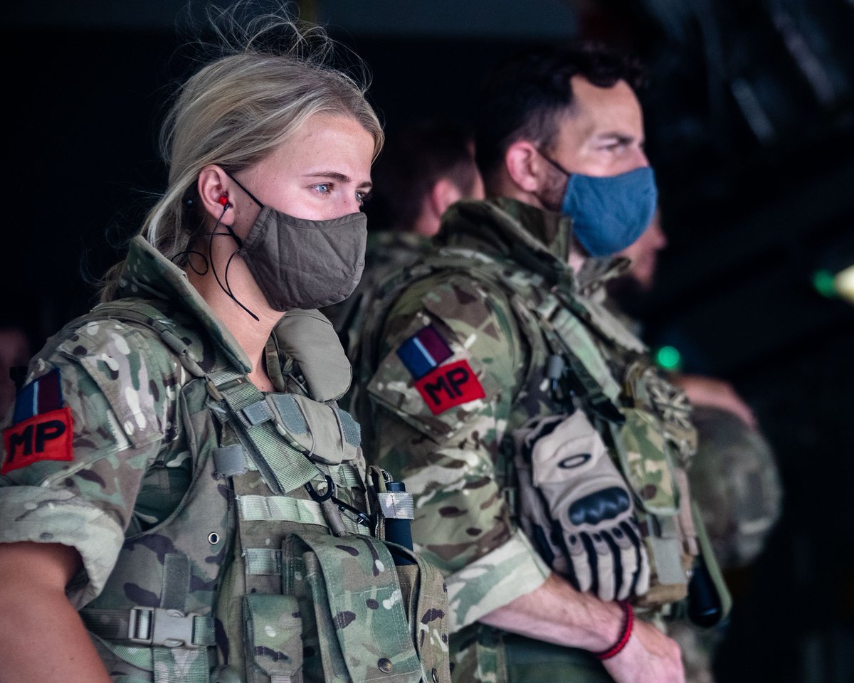 Member of the UK Armed Forces wearing a face mask.