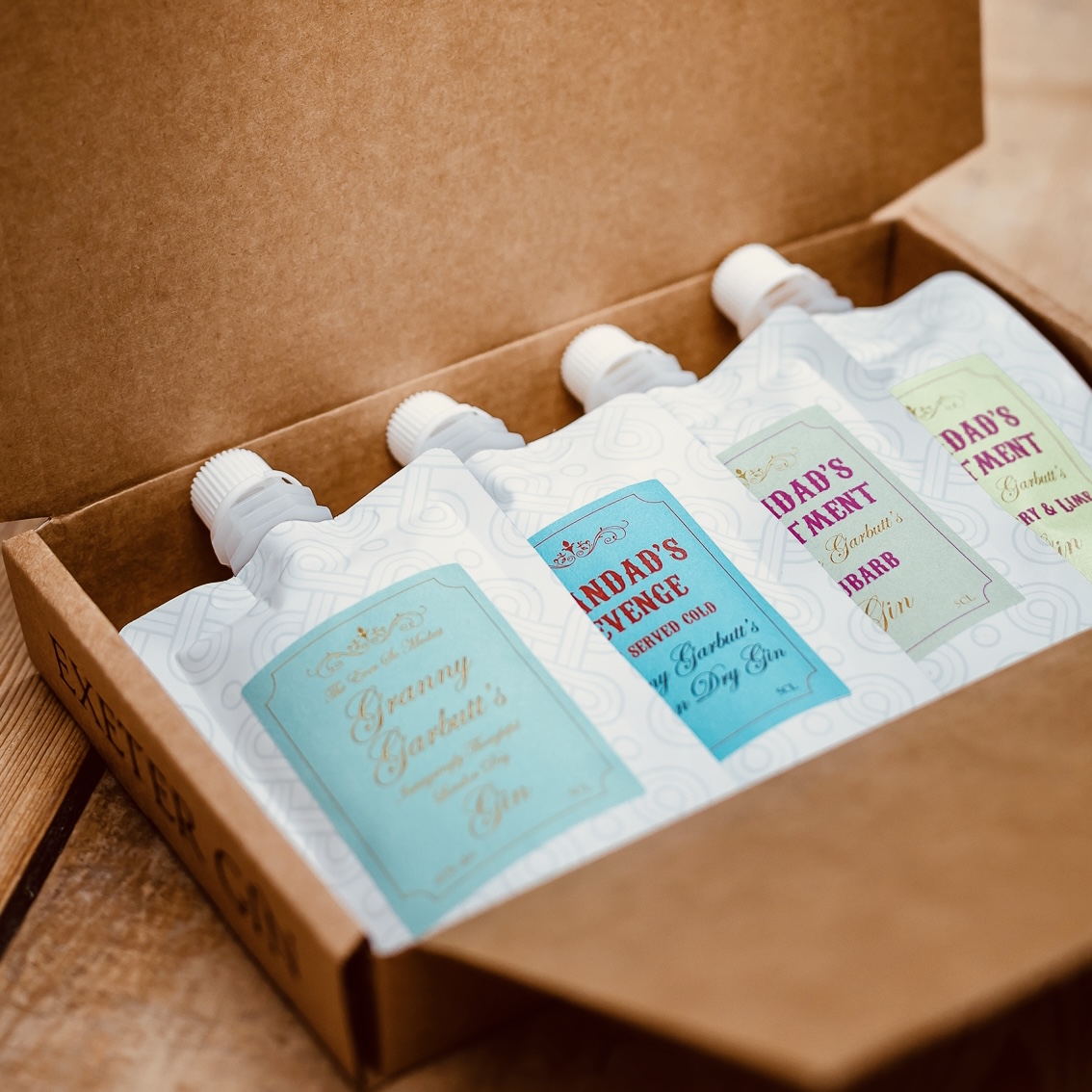 Open up a box of delight, four varieties of gin all with their own unique character! 🔥 From the rich tones of Grandad's Revenge navy strength to the sweet notes of his strawberry and lime allotment gin!
A perfect gift!
Available at: exetergin.com/collections/gr…

#ginpouch #ecogin