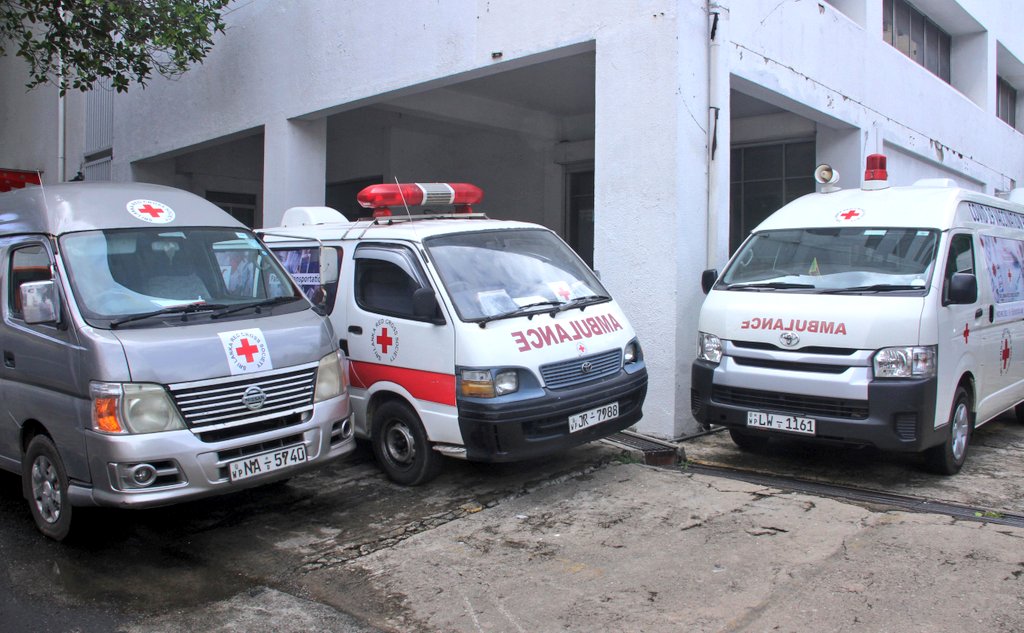 SLRedCross's tweet photo. The SLRCS is on mission to support authorities administer the #COVID19 vaccine &amp; has deployed its volunteers across SL to do so. Today our Colombo branch donated 3 ambulances to the Colombo Regional Director of Health Services to aid in the SL's mobile vaccination program. https://t.co/2cfrjA9QXY