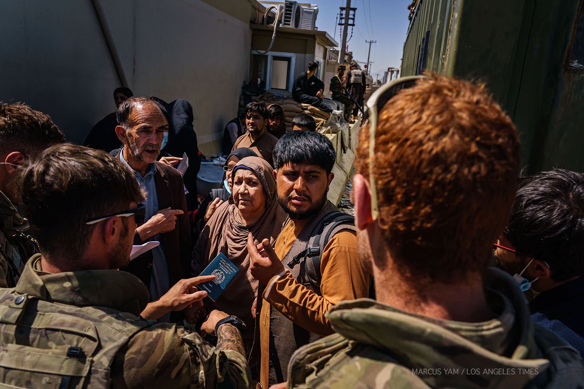 yamphoto's tweet photo. The sea of humanity continues to flow towards the airport. Afghans with paperwork have to traverse flooded streets, Taliban checkpoints, then a British checkpoint, before even getting processed for evacuation near Abbey Gate. #Afghanistan https://t.co/dHFSaH6KpK