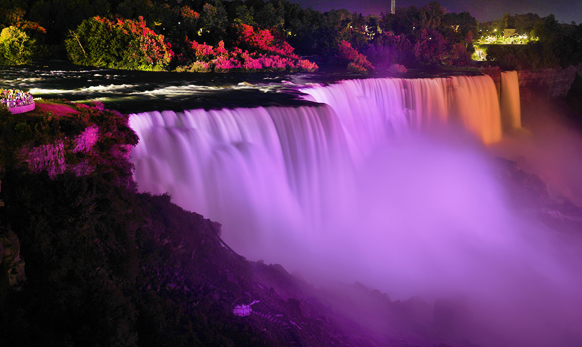Niagara Falls lit up in purple and gold in honor of Women's Equality Day