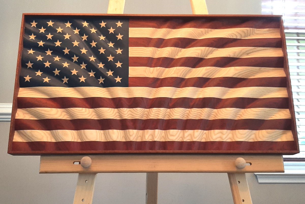LagunaTools's tweet photo. 🇺🇸 Beautiful flag made by Scott @benchmarkworkshop! Just look at that grain! 🤤 Lacewood frame with maple inlay and a birdseye accent. The making featured the F2 tablesaw and 16-32 drum sander.
#flagmaking #makingflags #americanflag #woodenflag #woodflag https://t.co/MsbvWllau4