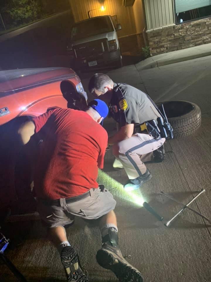 iowastatepatrol's tweet photo. Once a Trooper, Always a Trooper!
 
Recently, ISP 369 and former (retired) ISP 369 assisted a driver change their tire and get back on the road safely. This father-son duo has dedicated over 40 years of service helping motorists around the state of Iowa. #FatherSon #WeAreDPS https://t.co/F85iTT12Q9