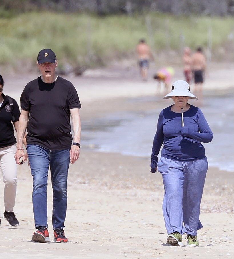 WHY ARE THESE 3 PEOPLE WEARING JEANS AT THE BEACH??? WHY IS THIS ONE PERSON FULLY COVERED IN CLOTHING??? 😷??? VACCINATED? SHOW THE PROOF??? AUGUST IS USUALLY A HOT MONTH 🥵