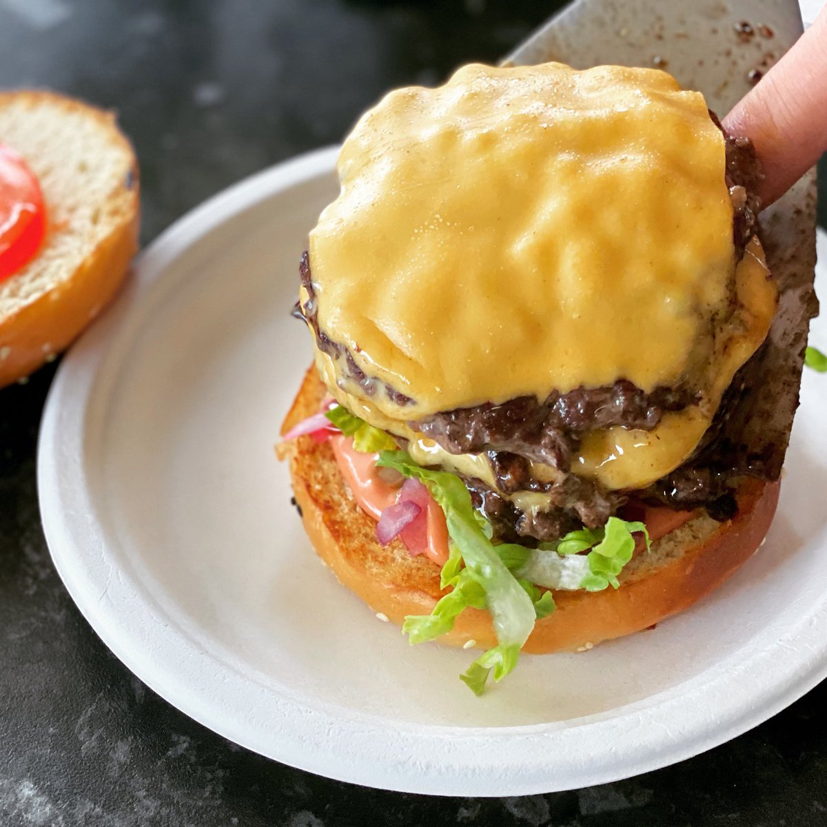 Here we have a smash burger being lovingly assembled by Steffen, our head chef, who will be leaving for pastures new in Norway after the bank holiday weekend.

Flipping burgers and serving sides today and Friday in Ventnor at St Catherine’s Church from 5pm.