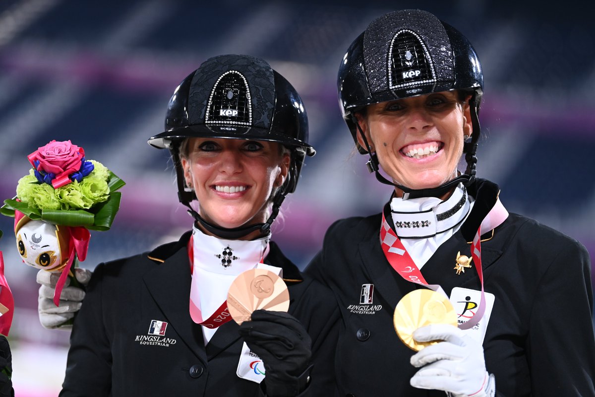 Bronze medal winner Paralympic jockey Manon Claeys and gold medal winner Belgian jockey Michele George celebrate after the dressage indivudual tests of the equestrian event on the second day of the Tokyo 2020 Paralympic Games, , in Tokyo, Japan. 
📷@JasperJacobs

#belgaimage