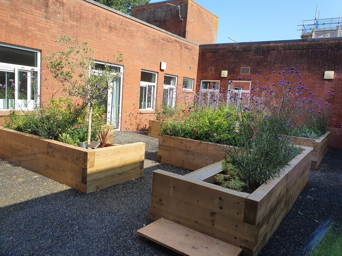 The redesigned courtyard at the Beech Unit, Torbay Hospital is now complete and looking lovely in the sunshine. The planters feature integrated seating and create a therapeutic space for inpatients at this Older Person’s Mental Health unit. <a href="/DPT_NHS/">Devon Partnership NHS Trust</a> 
#MentalHealthMatters