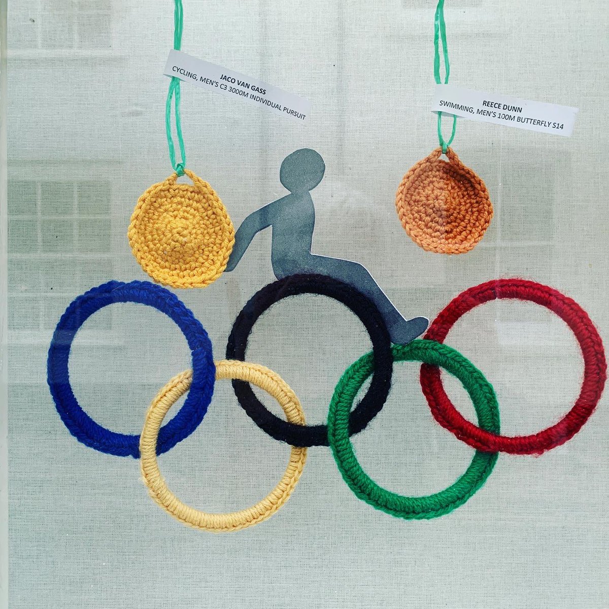 Brilliant start for <a href="/TeamGB/">Team GB</a> at the #tokyo2020 #paralympics. 17 medals already!! And fantastic coverage on <a href="/Channel4News/">Channel 4 News</a>. Wool worth commemorating with my crocheted medals! ❤️#knittersoftwitter #woolly #window <a href="/adamhillscomedy/">Adam Hills</a>