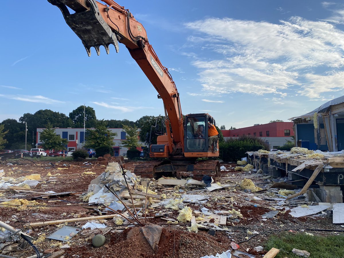 lcs_lincolnton's tweet photo. Ms. Peterman got to help out with demo on the old K-1 building today! By the end of the day it was gone! Ready for more improvements!! #lcseagles #preparingtosoar https://t.co/7PfFjHO31f