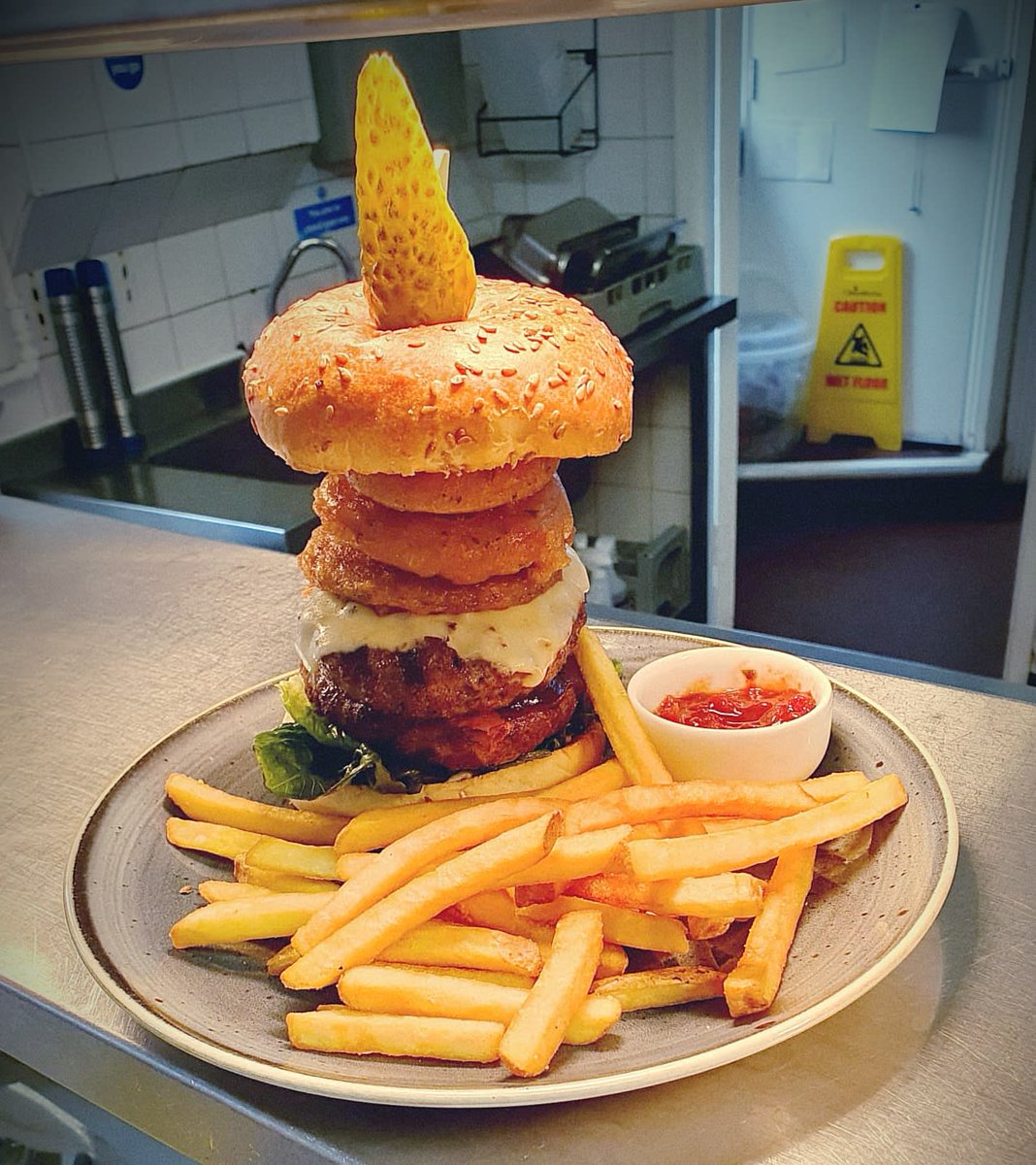 Now that's what I call a stack! 🤤🍔
 
Two chargrilled beef burgers, smoked back bacon, Monterey Jack cheese &amp; hand-battered onion rings! Served on a toasted linseed bun with lettuce, gherkin, tomato &amp; mayo this is a burger of the gods.

Come grab your nicholsons burger today! Mm