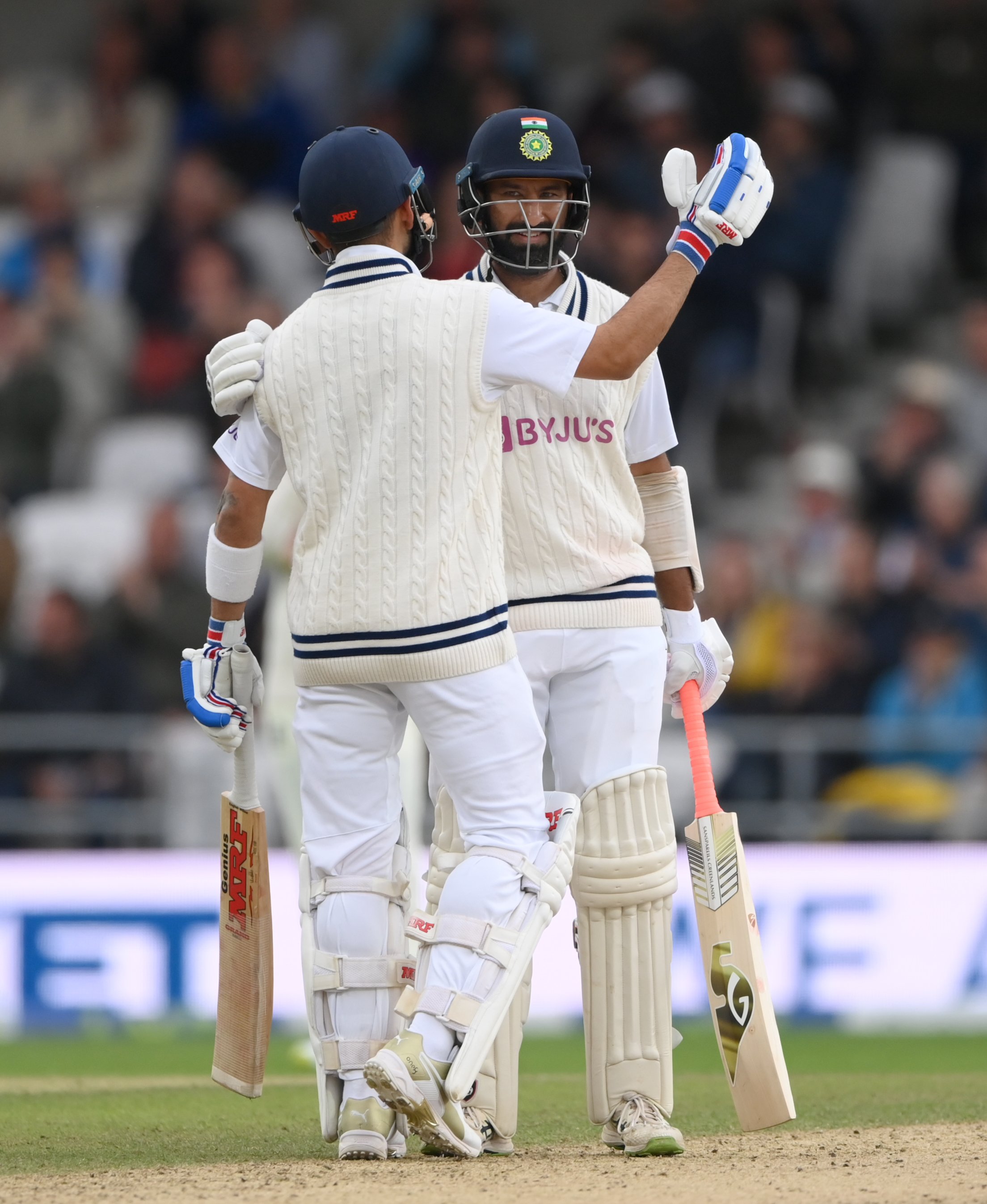 Ind vs Eng 3rd test, Virat Kohli and Cheteshwar Pujara celebrates 50 runs stand.