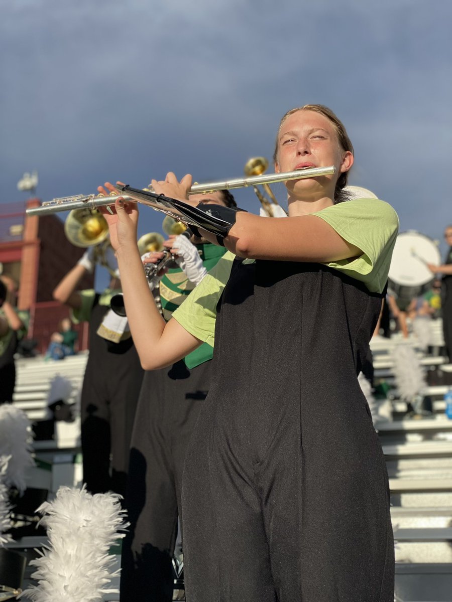 Student Ashleigh Messall, 11, performs at the first football game of the season on Aug. 26, 2021 at Shea Stadium. “It feels great to play again, especially because we haven’t been able to for so long,” Messall said. 
 Photo by: Edie Cingrani