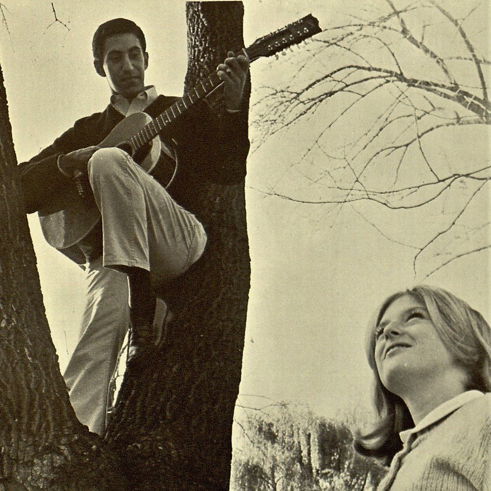 Check out this newly discovered pic of legendary songwriter Jim Croce, from his senior yearbook (1965). Famous for his song "Time in a Bottle, Croce lounges in a campus tree and strums his guitar as a co-ed listens on. Source: <a href="/VillanovaDigLib/">Villanova Digital Library</a>. #archives blog.library.villanova.edu/2021/08/27/jim…