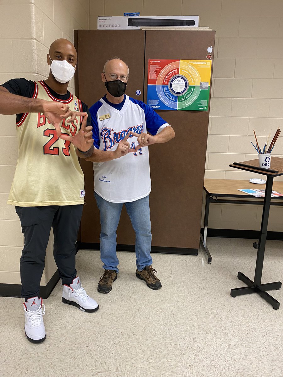 Your favorite #deca advisors are here for #SpiritFridays jersey day! Two of the greats! MJ and Hammerin Hank! <a href="/JohnsCreekDeca/">Johns Creek DECA</a> <a href="/JCGladiatorArmy/">Gladiator Army</a>