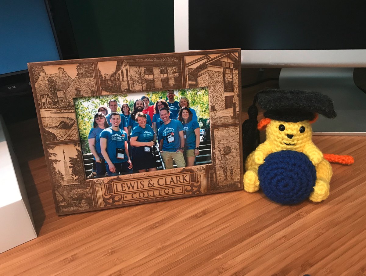 The organizing committee bought me a beautiful photo frame from our host college, Lewis and Clark College. It now sits on my desk and is home to a photo of the organizing team.