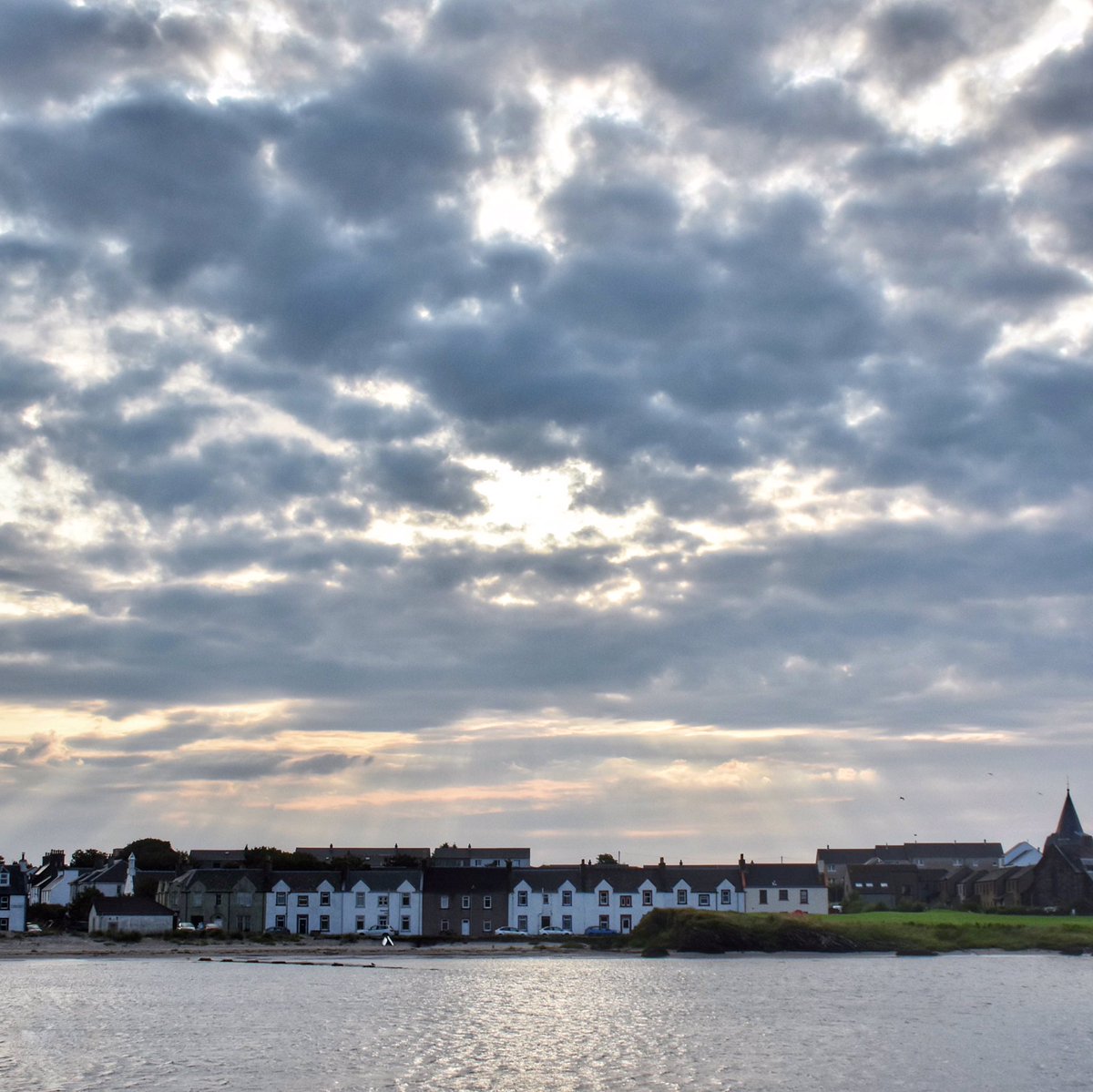 yachtnova's tweet photo. #DailySky - Day 82 - Dappled morning skies from our berth at the unexpectedly pretty harbour of Port Ellen, from where we made a happy and rather moving visit to @Bruichladdich which is part of our family story #AroundTheseIslands https://t.co/9EHQnTgNkR