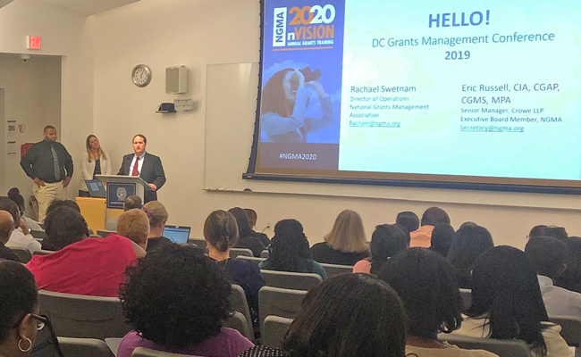 NGMAnews's tweet photo. Eric Russell, NGMA Board Member, and Rachael Swetnam, NGMA Director of Operations, present at the DC Grants Management conference on the CGMS credential and how it demonstrates expertise and leadership in the field. Learn More : CGMS@ngma.org #grantsmanagement #cgms #NGMA2020 https://t.co/d7HQeN17gy