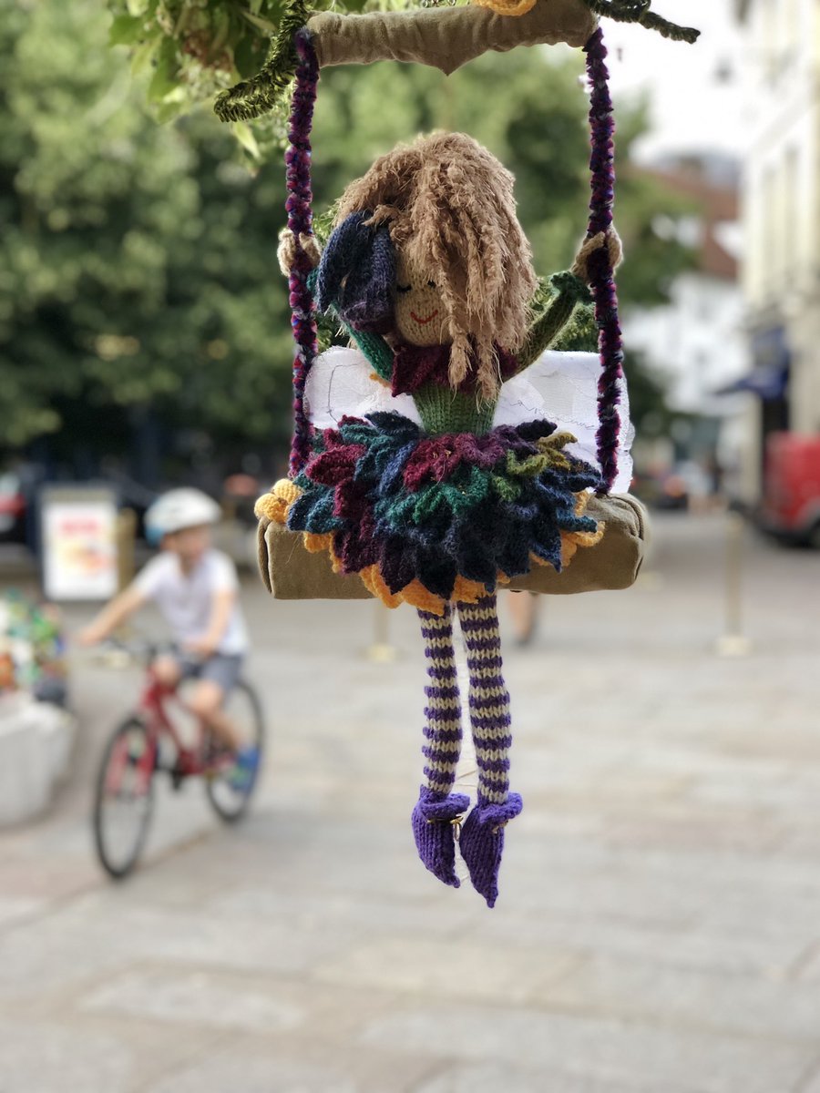 FionaSinnott's tweet photo. In other #crafting news, the Secret Society of Hertford Crafters have been busy! Another #Yarnbomb hit at dead of night & transformed the town into an #EnchantedWonderland to raise funds for @chipsplay. £5k+ raised already 🧶 #knitting #craft #creativejuly https://t.co/RmX2CkjFd0