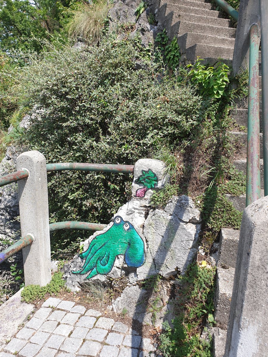 93. Spot the river, the cafe in the river (it's so gorgeous!) and street art that's probably telling me, "Monsters ahead" but DO I LISTEN???  #Schlossberg