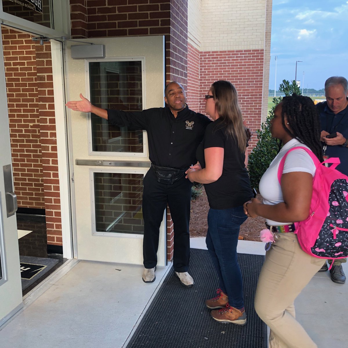 ajcdevelopment's tweet image. McDonough Middle School Principal Lawrence Gwynn welcomes parents and students to the first day of school. #AJCBackToSchool