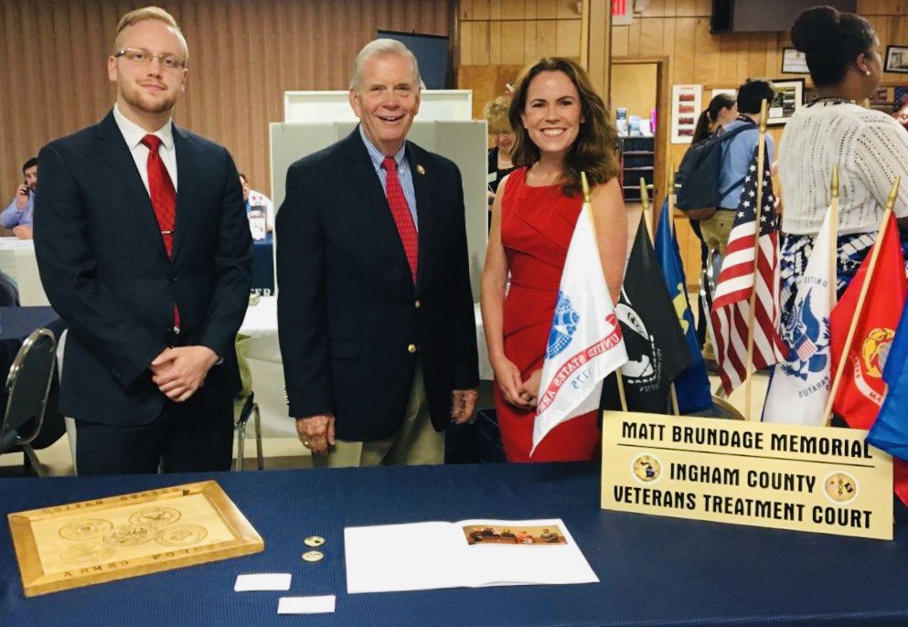 District54b's tweet photo. Great day in Lansing.  The Ingham County Veterans Treatment Court representing at the Veterans Resource Fair! Thanks for your support, @RepSlotkin and @RepWalberg https://t.co/NcraEi22pA