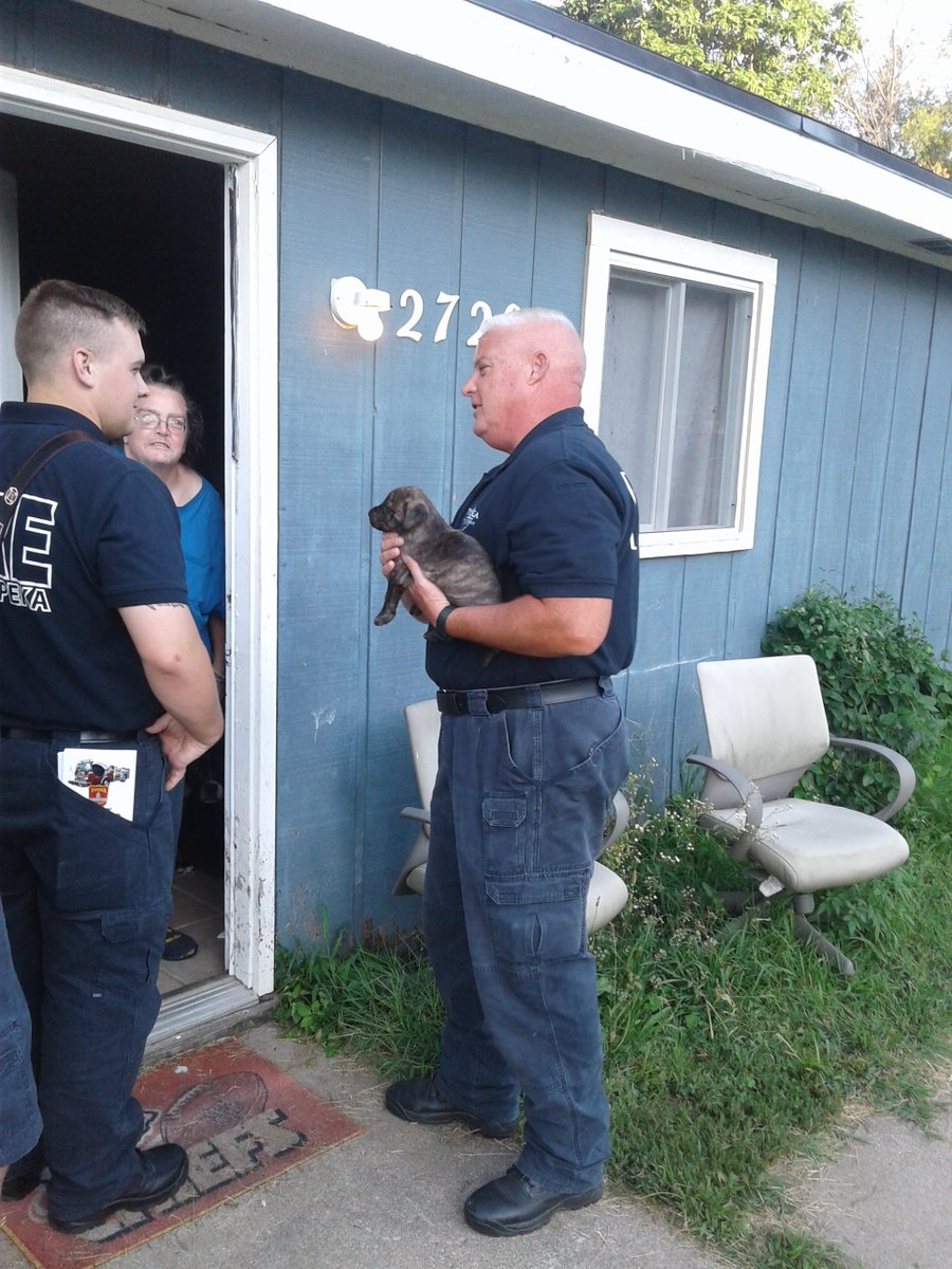 After a recent fire in the 2600 block og SE Colorado, Captain Dave Owen and Firefighter Jace Holmes from Truck 9 speak to a neighbor about fire safety and the importance of working smoke detectors in their homes. Looks like Captain Owen found a new friend.