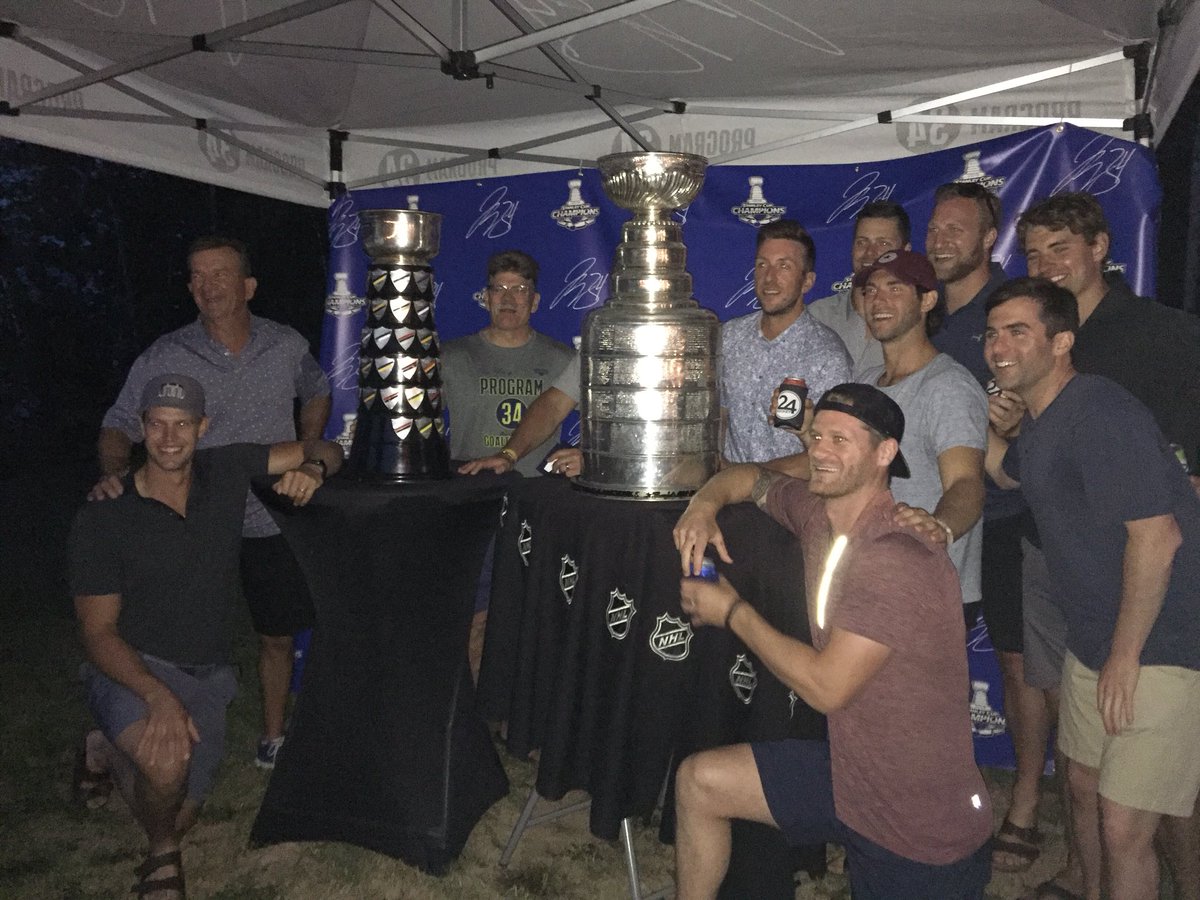 UNBMHockey's tweet photo. A LOT of people asking...did Irene meet Stanley!?

The answer is yes!! Congrats Jakey! We are so proud. 

Happy NB Day to all. #NBproud https://t.co/IxFZo0rUNv