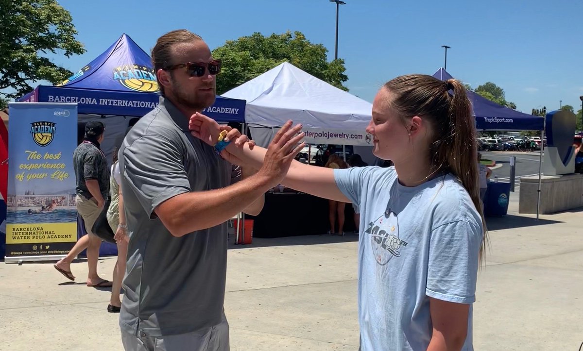VBHSWaterPolo's tweet photo. We met up with Former USA National Team, Water Polo player @GregEnloe at the Junior Olympics last week.  He gave our new Virginia Beach team some excellent advice!  Thanks Coach Enloe! @USAWP https://t.co/kEXw0xBPpG