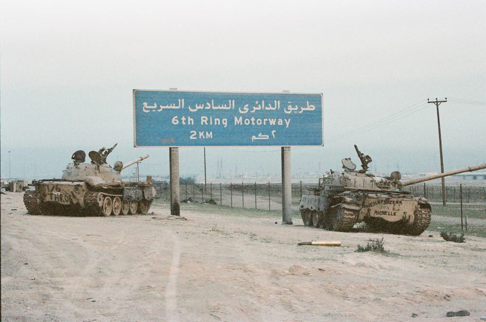 Kuwaiti Chieftain tanks opened up at a range of 1500m, destroying several Iraqi tanks & taking the column completely by surprise. An Iraqi command vehicle sauntering under the bridge was blown into the roof, the burn marks from which are still in evidence today /26