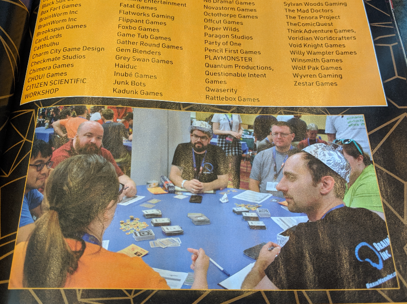 BrainWormInc's tweet photo. Good news everyone! We're #GenCon magazine famous! 

Check out this serious business pic of us from 2017 on page 67 of the 2019 guide!

Other than Lock and Brent, we're joined by Cara, Justin, Josh, George and Maya.

#YesWeSignAutographs #SmizeMore
#boardgames #tabletop https://t.co/DrP0oohdTm