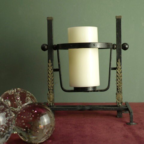 This vintage dubouche cognac iron tilting stand makes an unusual holder for a plant or candle, when not being used for pouring brandy. More details on our website: coindeparadis.co.uk