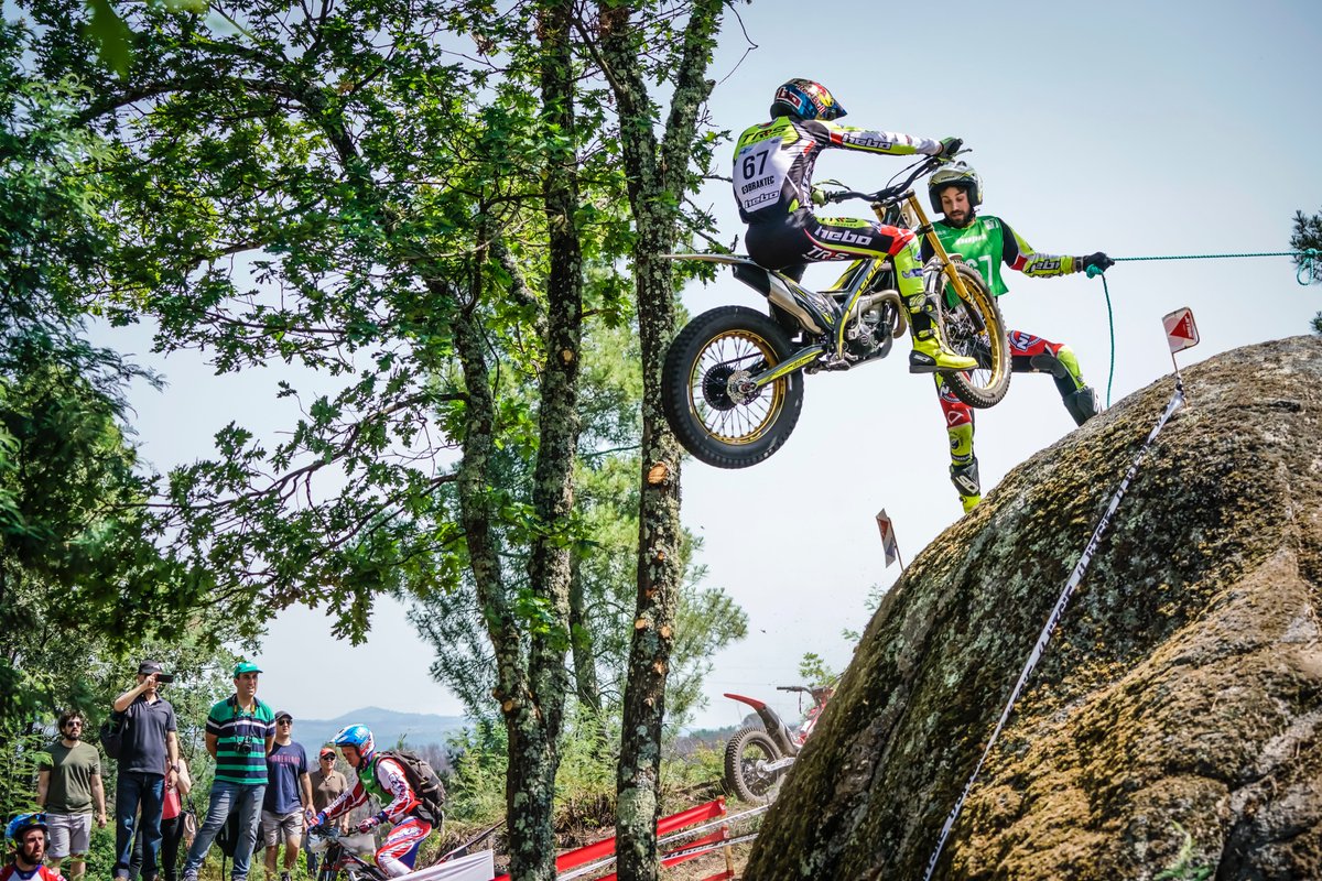 TrialGP's tweet image. When minders earn their money! @AdamRagaSans is in safe hands. Pic @pep_segales @TRS_Motorcycles #FiveFriday #FIMTrialGP #WeAreTrialGP