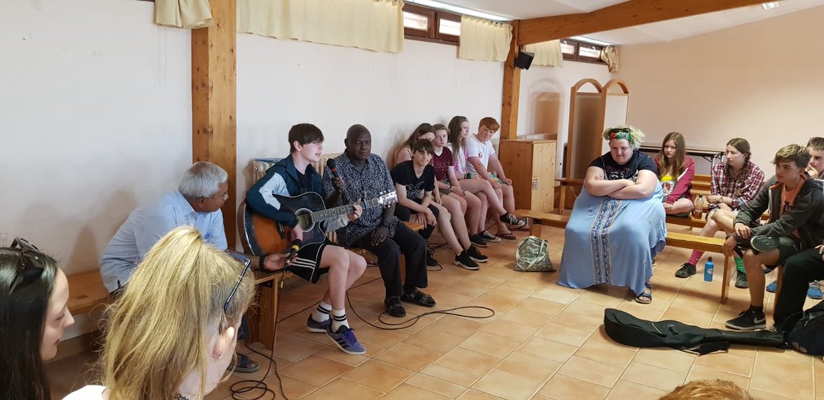 HighTaize's tweet photo. Incredibly proud of our brave students sharing their Taizé experiences in the UK meeting the other night. What an impact this adventure has had on each of them! #taize2019 https://t.co/2kH7a8H2Lk