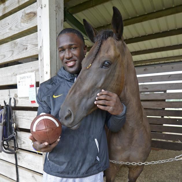 theadvocatebr's tweet photo. Daisy Mae, the horse that Devin White rode through Tiger Stadium, died this weekend. Here's what the former Tiger had to say about his beloved pet. https://t.co/ma9py1zSBV https://t.co/hMlxnFRL5t