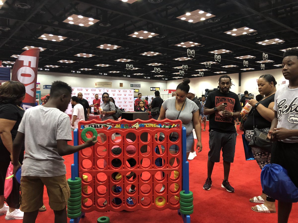 Hot1009indy's tweet photo. We’re at the Indiana Black Expo, Inc. having fun with the community. The exhibit is FREE! Check Indianapolis Black own comic books, all of the Divine 9, Meijer is giving away full size bottle of Mielle Organics inside the health fair, and much more #Hot963 #HotRunsIndy #IBE19 https://t.co/46KrOPS6w3